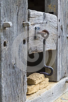 Rustic door latch on wooden door