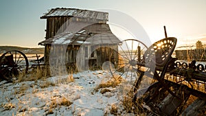 Rustic farm sceen with sun start through field rake