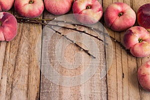 Rustic flat donut peach background on rough wooden plank background photo