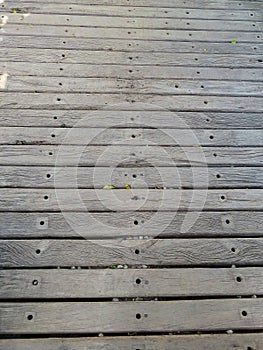 Rustic floor of horizontal parallel wooden boards with texture
