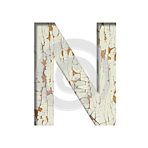 Rustic font. The letter N cut out of paper on the background of old rustic wall with peeling paint and cracks. Set of simple