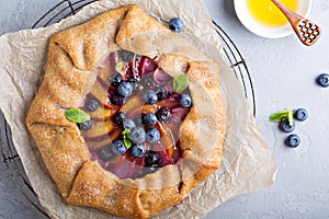Rustic gallette pie with peaches and blueberry