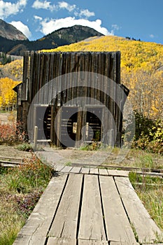 Rustic ghost town Post Office in Fall