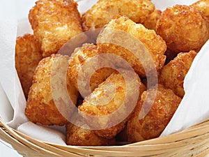 Rustic golden potato tater tots photo