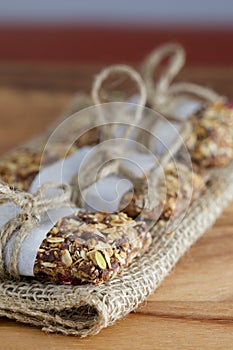 Rustic Granola Bars in a row and on Burlap with Twine