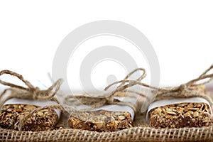 Rustic Granola Bars wrapped with Twine on Burlap White BG