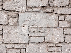 Rustic gray stone wall texture for background or design