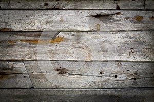 Rustic grey wood planks background with nice vignetting photo