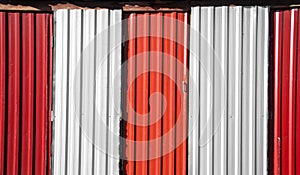 Rustic grunge red and white metallic wall and door dirty back street ghetto background