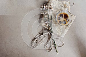 Rustic home design with dried flowers and a cup of iced coffee