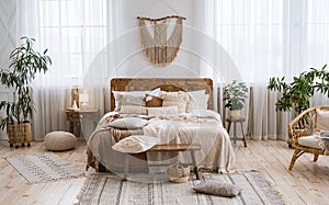 Rustic home design with ethnic boho decoration. Bed with pillows, wooden furniture