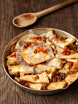 Rustic italian pasta in ragu sauce