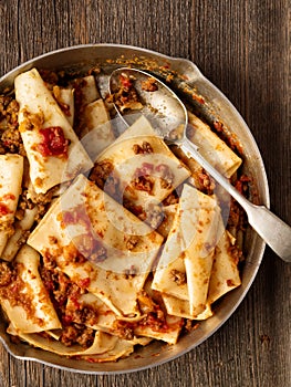 Rustic italian pasta in ragu sauce