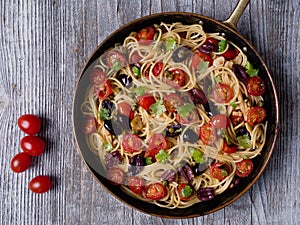 Rustic italian spaghetti puttanesca pasta