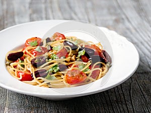 Rustic italian spaghetti puttanesca pasta