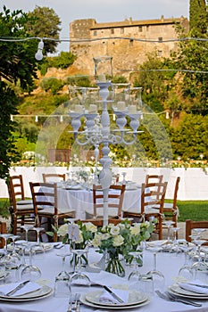 Rustic Italian wedding venue with outdoor seating.