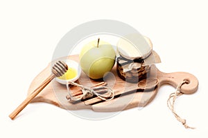 Rustic kitchen composition. Apples, nuts and honey isolated on white