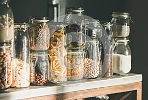 Rustic kitchen food storage arrangement over kitchen counter