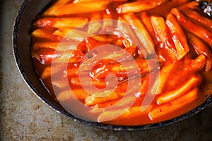 Rustic korean spicy rice cake tteokbokki photo