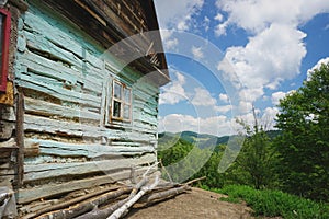 Rustic landscape with side of old wooden house