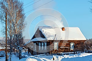 Rustic log house in russian village Visim. Sverdlovsk region, Russia.