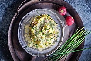 Rustic mashed potato with scallions above