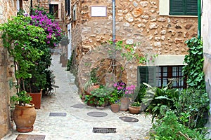 Rustic patio in Mediterranean village Fornalutx, Majorca, Spain