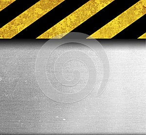 Rustic metal background with warning stripes