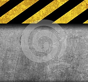 Rustic metal background with warning stripes