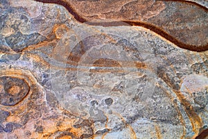 Rustic mineral backdrop with flowing textures