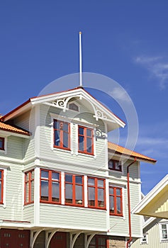 Rustic old house gable with windows