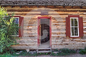 Rustic Old Time Log Cabin Front Door and Windows photo