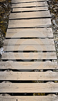 Rustic old wooden footbridge