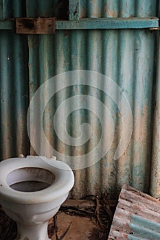 Rustic outhouse toilet
