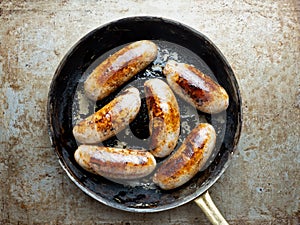 Rustic pan roasted sausages photo