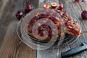 Rustic plum cake or plum pie baked upside down