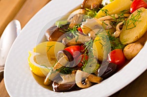 Rustic pottage with mushrooms and vegetables