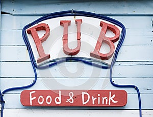 A rustic pub sign