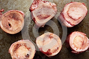 Rustic raw uncooked beef bone marrow