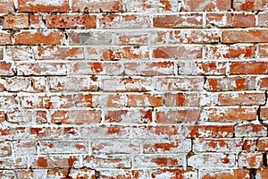 Rustic red brick background with white paint