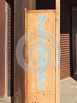 Rustic restroom sign