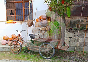 Rustic retro bike and carrier cycle in Hongcun (Hong Cun), China photo