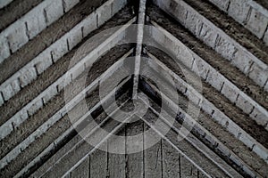 Rustic roof structure and support beams.