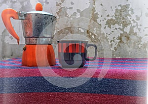 Coffee cup and a kettle