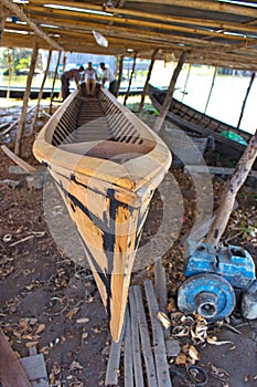 Rustic shipyard with unfinished boat