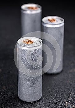 Rustic slate slab with Energy Drinks, selective focus