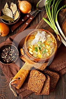 Rustic sour cabbage soup in   ceramic bowl. Traditional russian, belorussian and ukrainian  cuisine