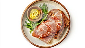 Rustic speck platter with rye bread and mustard for gourmet dining photo