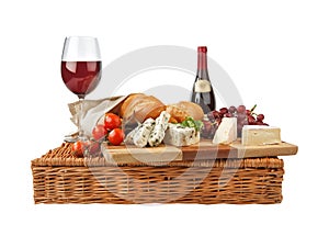 Rustic still life with cheese, bread, grapes, tomatoes, parsley and