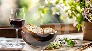 Rustic still life red wine, bread, flowers